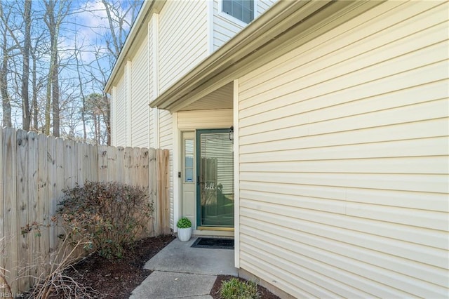 view of side of property with fence