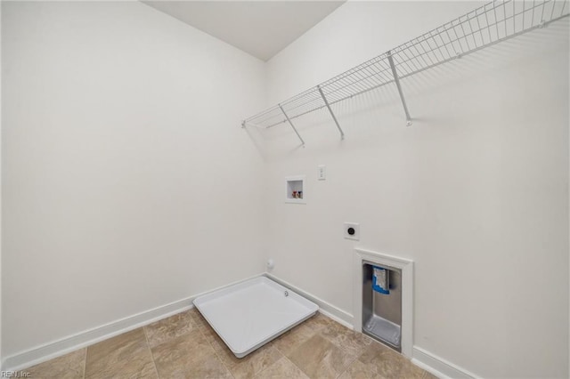 clothes washing area featuring hookup for a washing machine, laundry area, hookup for an electric dryer, and baseboards