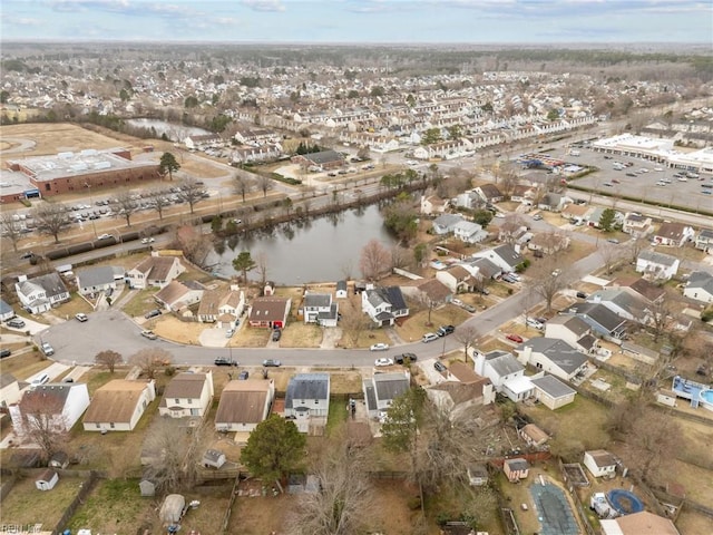 aerial view featuring a residential view and a water view