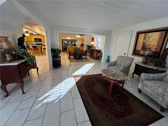 living room featuring ceiling fan