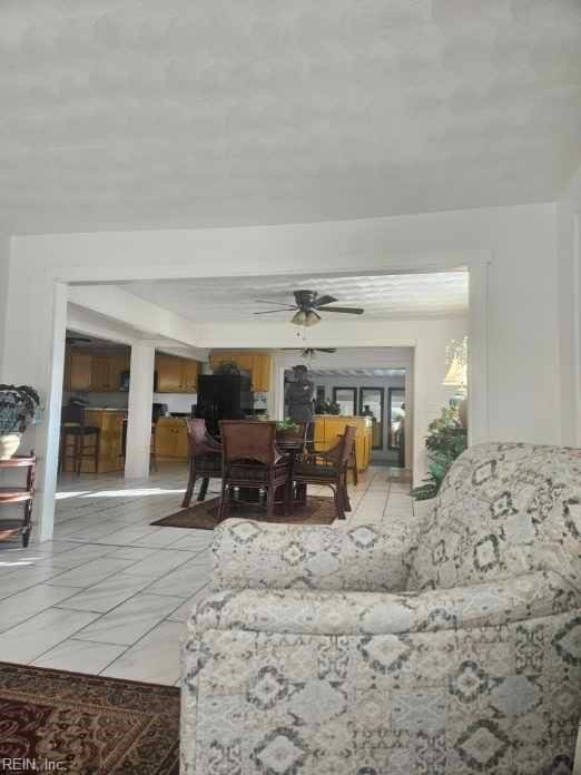 living room with ceiling fan