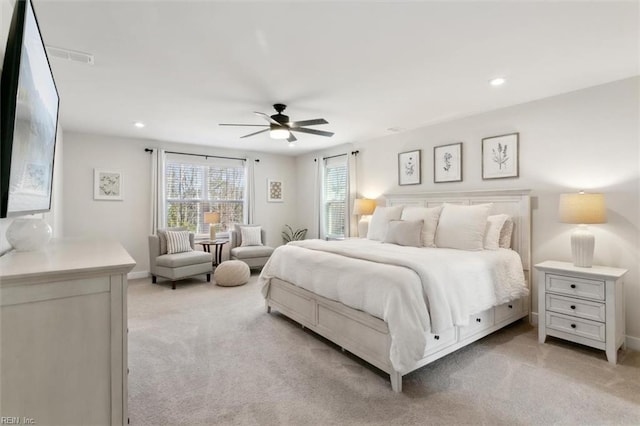 bedroom with light carpet, baseboards, a ceiling fan, and recessed lighting