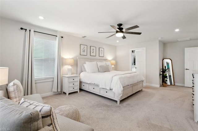 bedroom featuring light carpet, recessed lighting, visible vents, and baseboards