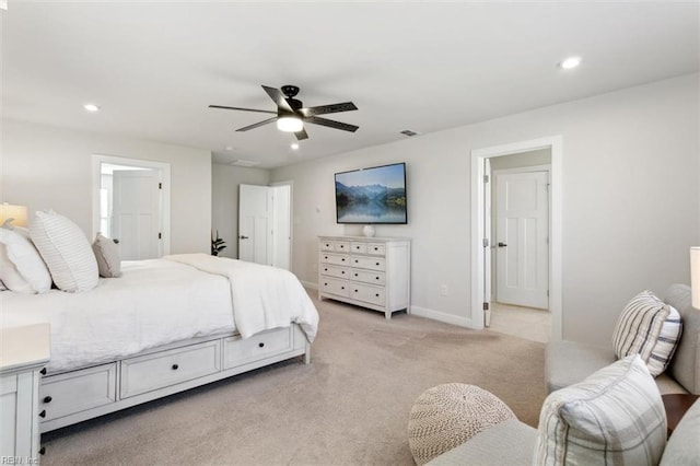 bedroom featuring visible vents, baseboards, a ceiling fan, light colored carpet, and recessed lighting