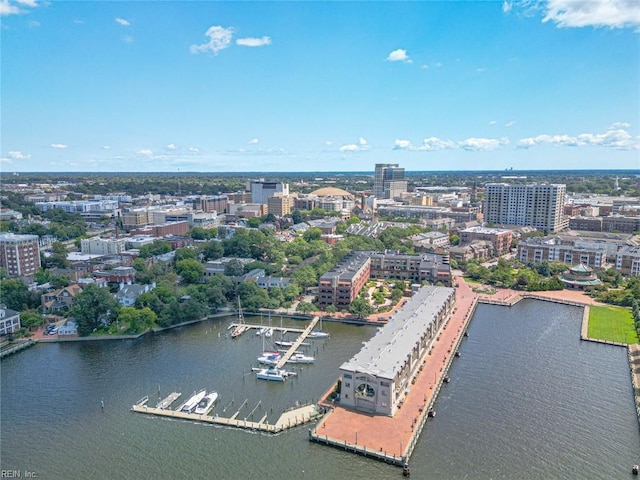 aerial view featuring a view of city and a water view