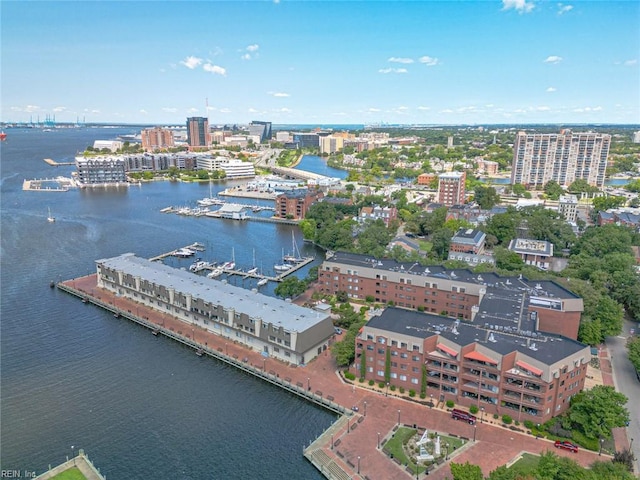 bird's eye view featuring a water view and a city view