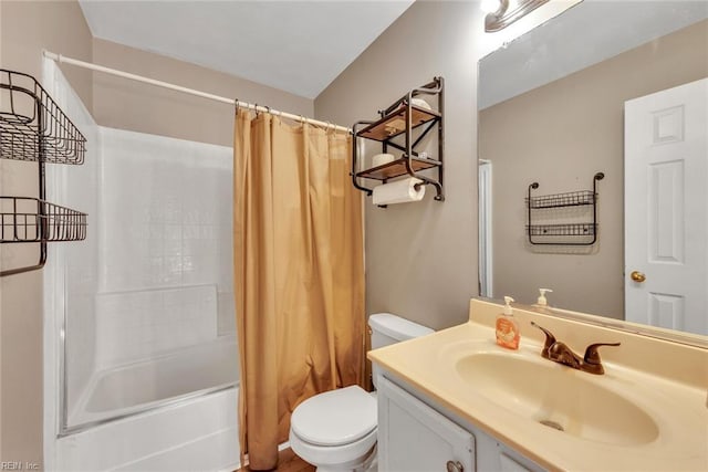 full bath featuring shower / tub combo, vanity, and toilet