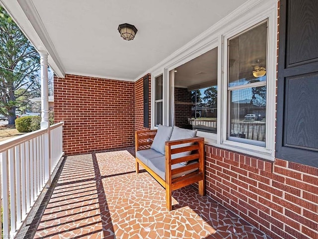 balcony featuring a porch