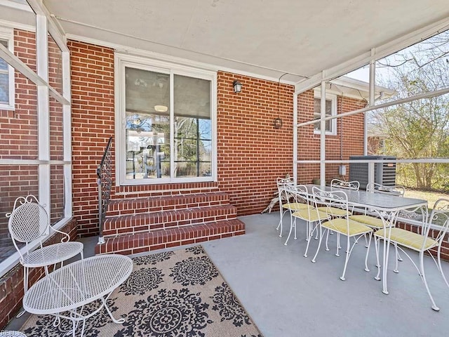 view of patio / terrace featuring central AC unit and outdoor dining space