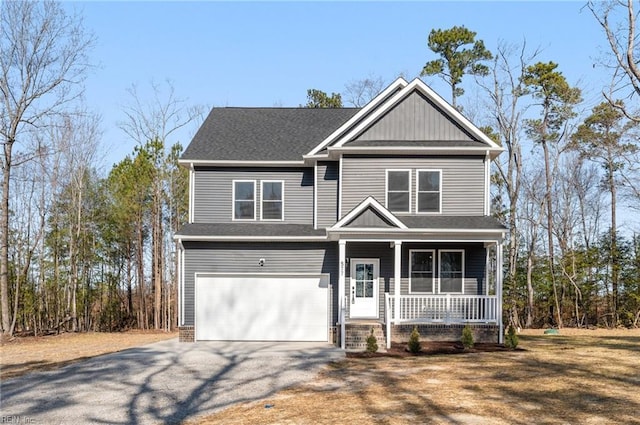 view of front of property with a porch, roof with shingles, a garage, and aphalt driveway