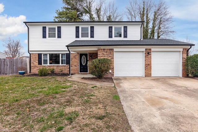 traditional home with concrete driveway, brick siding, fence, and a front lawn