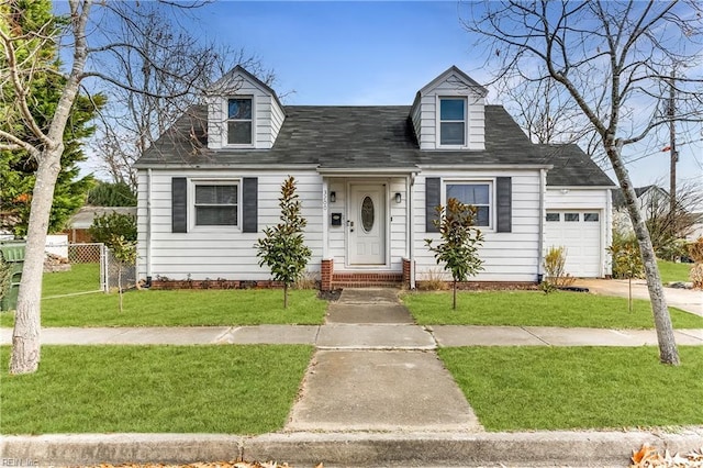 cape cod home with an attached garage, fence, and a front lawn