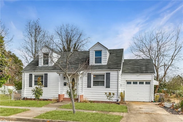 cape cod home featuring concrete driveway, an attached garage, a front lawn, and fence