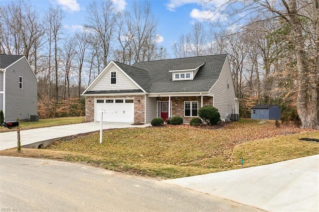 view of front of home with a garage, central air condition unit, a front lawn, and concrete driveway