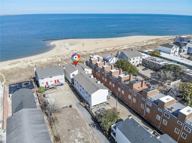 aerial view featuring a water view and a view of the beach