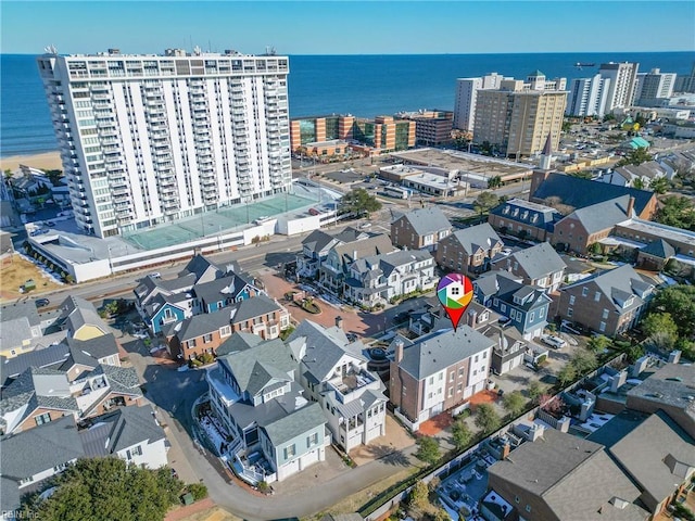 drone / aerial view with a view of city and a water view