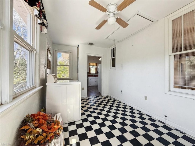 unfurnished sunroom with washer / dryer and visible vents