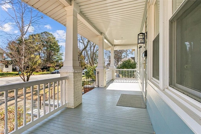 wooden deck with a porch