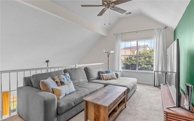 living room featuring carpet floors, ceiling fan, visible vents, and lofted ceiling