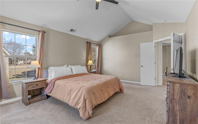 bedroom featuring light carpet, visible vents, baseboards, lofted ceiling, and ceiling fan