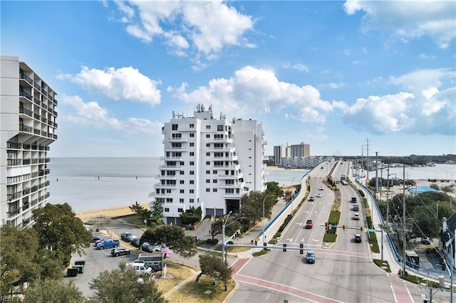 exterior space featuring a view of city and a water view