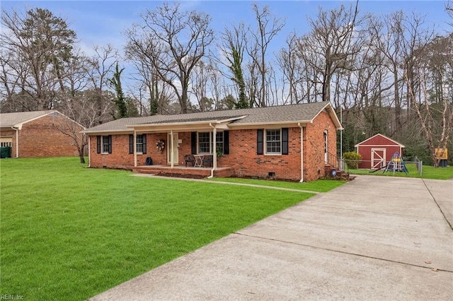 ranch-style house featuring brick siding, a porch, crawl space, driveway, and a front lawn