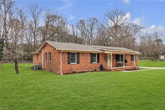 single story home featuring crawl space, fence, a front lawn, central AC, and brick siding