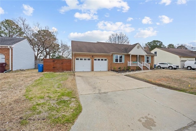 single story home with an attached garage, concrete driveway, and brick siding