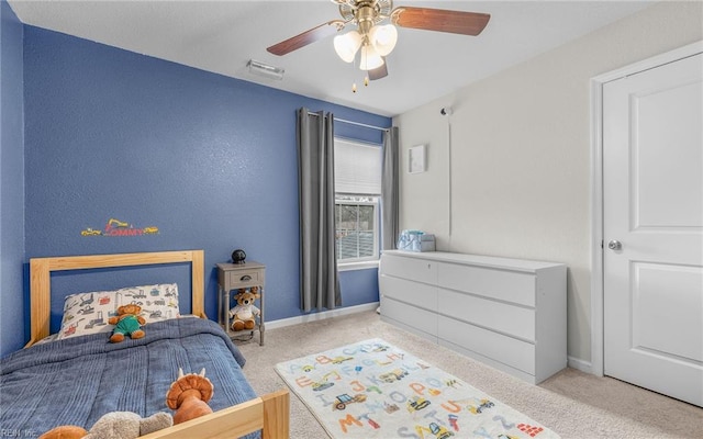 bedroom featuring light colored carpet, visible vents, and baseboards