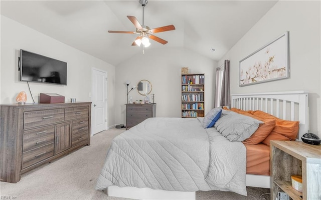 bedroom with light carpet, ceiling fan, and lofted ceiling