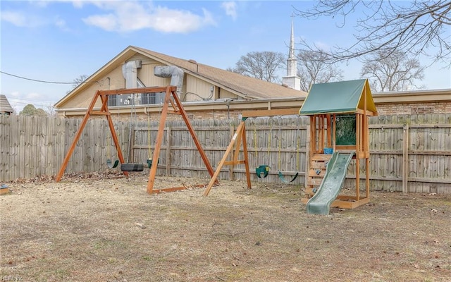 view of play area with a fenced backyard