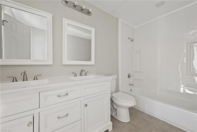 full bath with tile patterned flooring, double vanity, toilet, and a sink