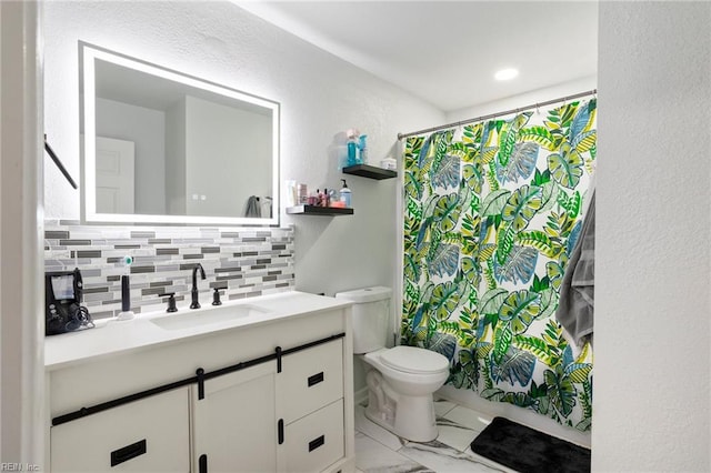 full bath with decorative backsplash, toilet, marble finish floor, curtained shower, and vanity