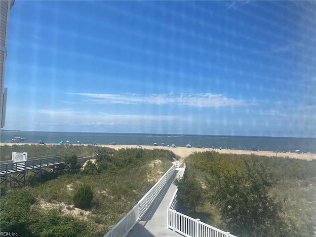 view of water feature with a beach view