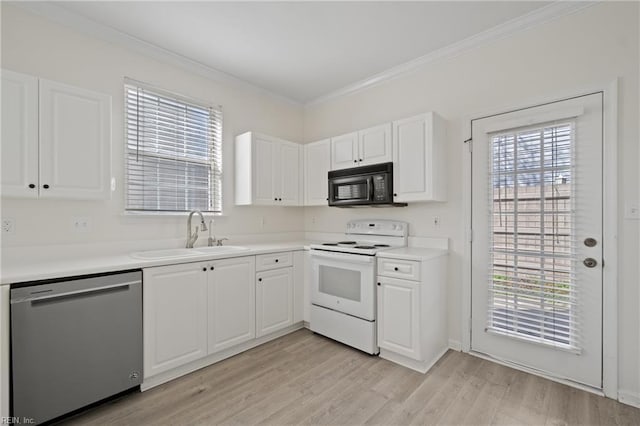 kitchen with dishwasher, crown molding, white electric range, black microwave, and a sink