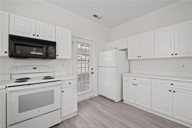 kitchen featuring white appliances, light wood-style floors, light countertops, and crown molding