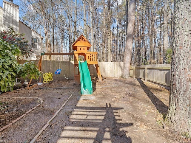 view of playground with fence