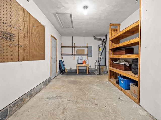 storage featuring a garage, gas water heater, and electric panel