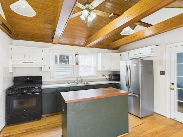 kitchen featuring under cabinet range hood, a sink, white cabinets, light wood-type flooring, and black appliances