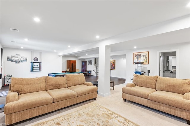 living area with stairway, recessed lighting, and baseboards