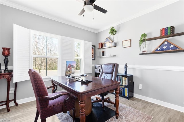 home office with ornamental molding, baseboards, and wood finished floors