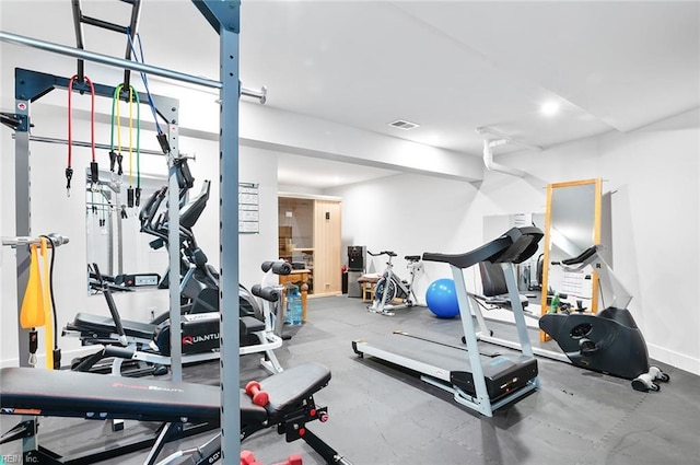 workout area featuring visible vents and baseboards