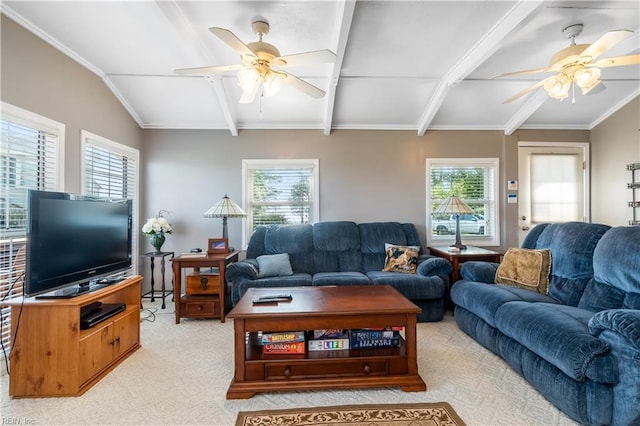 living room with lofted ceiling with beams, ceiling fan, ornamental molding, and light colored carpet