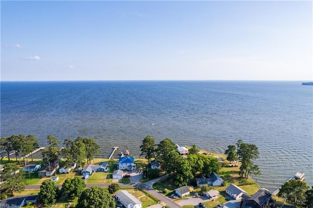 bird's eye view with a water view and a residential view