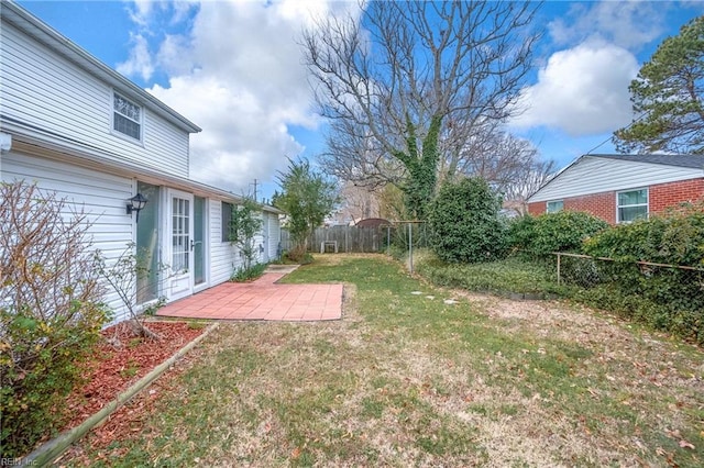 view of yard featuring a patio area and a fenced backyard