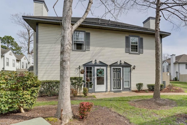 view of front of property featuring a chimney