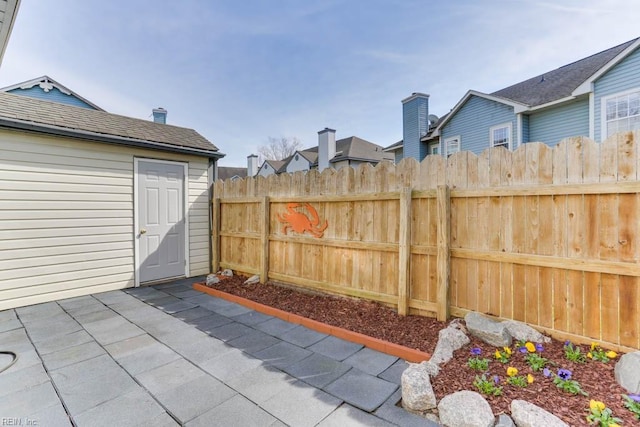 view of patio featuring fence