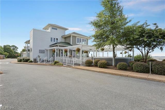 view of front of home with fence