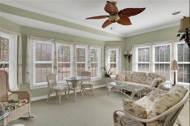 sunroom / solarium featuring visible vents and ceiling fan