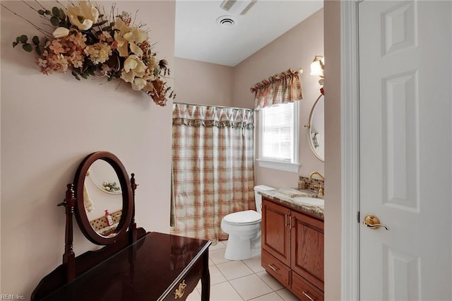 full bath featuring vanity, tile patterned floors, toilet, and a shower with shower curtain